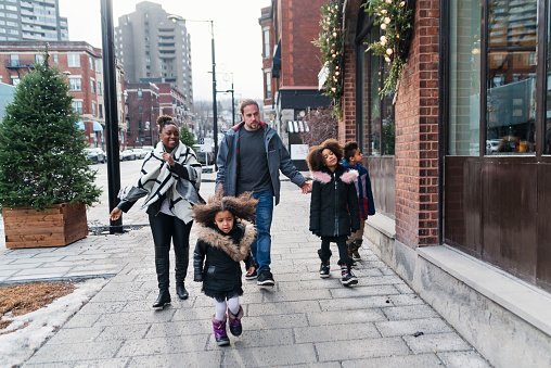 A family walking together on a city street